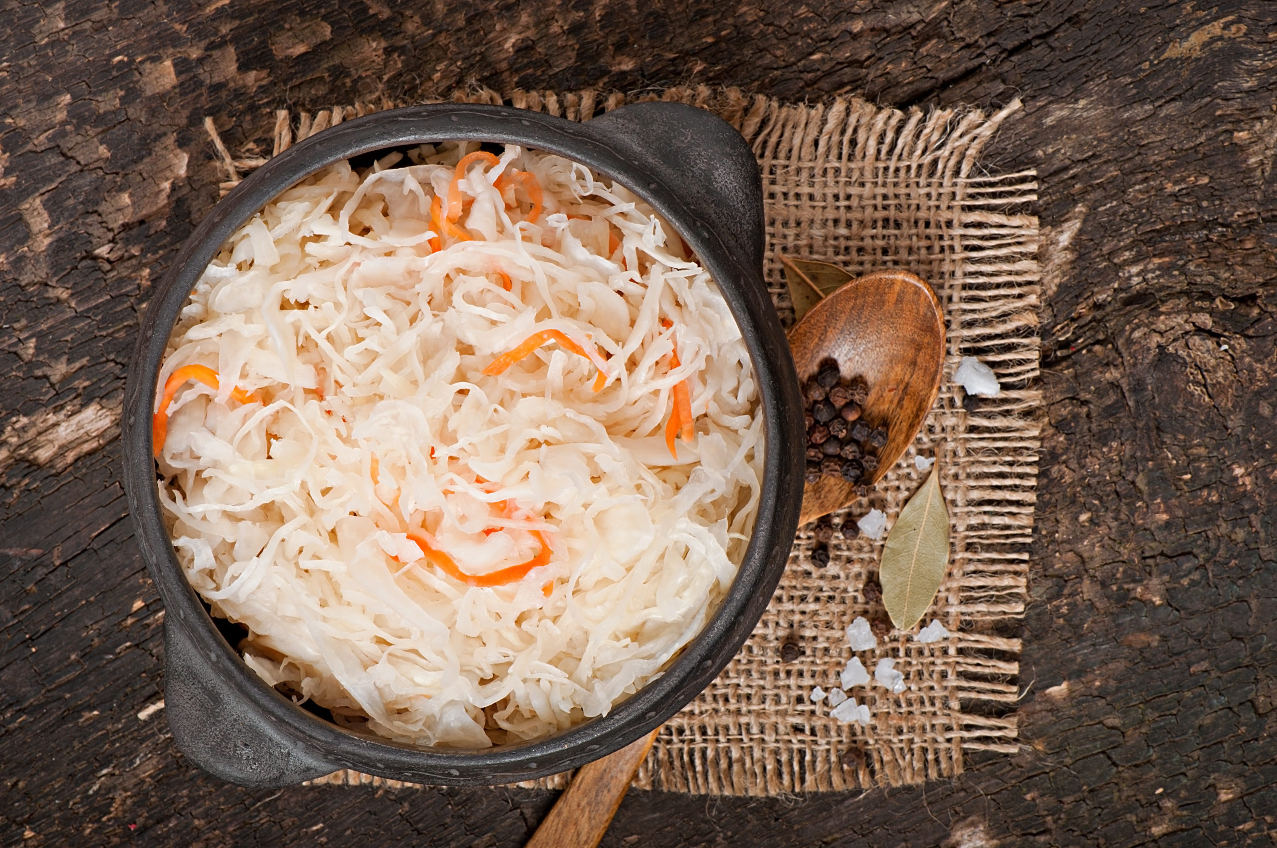 sauerkraut-with-carrot-wooden-bowl