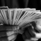 closeup-hands-holding-cash