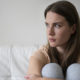 front-view-anxious-woman-couch