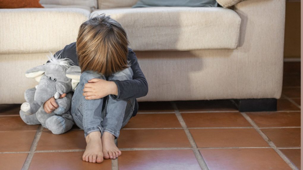 little-boy-outdoors-upset-holding-his-toy little-boy-outdoors-upset-holding-his-toy