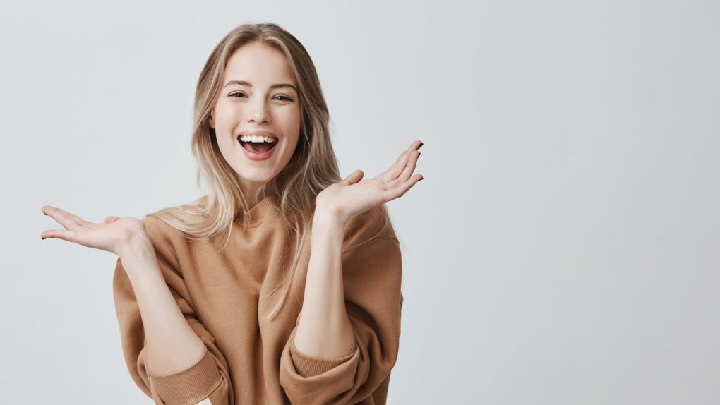 pretty-beautiful-woman-with-blonde-long-hair-having-excited-happy-facial-expression