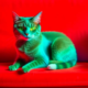 Зелёная кошка на красном диване
