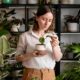 woman-growing-plants-at-home_23-2148928463