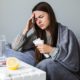 woman-on-couch-with-medication_23-2147934385