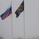 Флаги РФ и ЧВК на кладбище