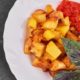 fried-potatoes-with-tomato-sauce-basilic_114579-17719
