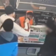 Скрин видео - довольные юноши на кассе