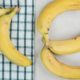 bunch-yellow-bananas-striped-tablecloth_114579-57737