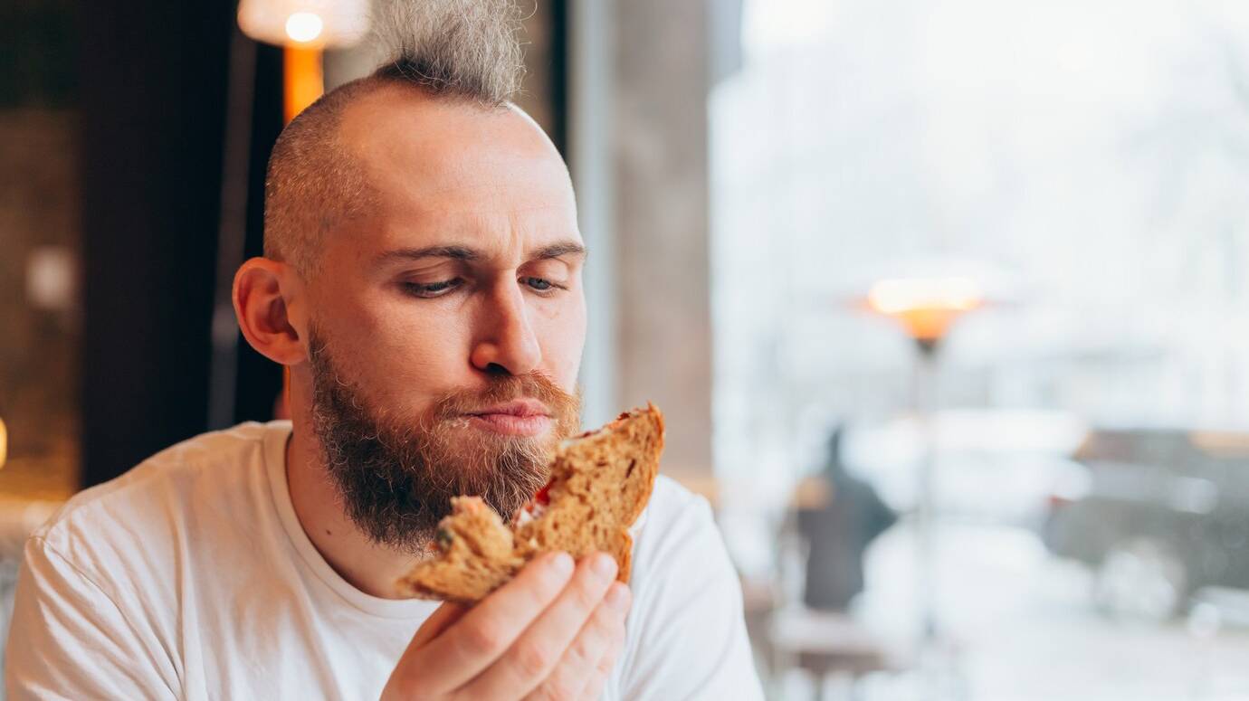 brutal-man-european-appearance-cafe-has-delicious-sandwich_343596-4676