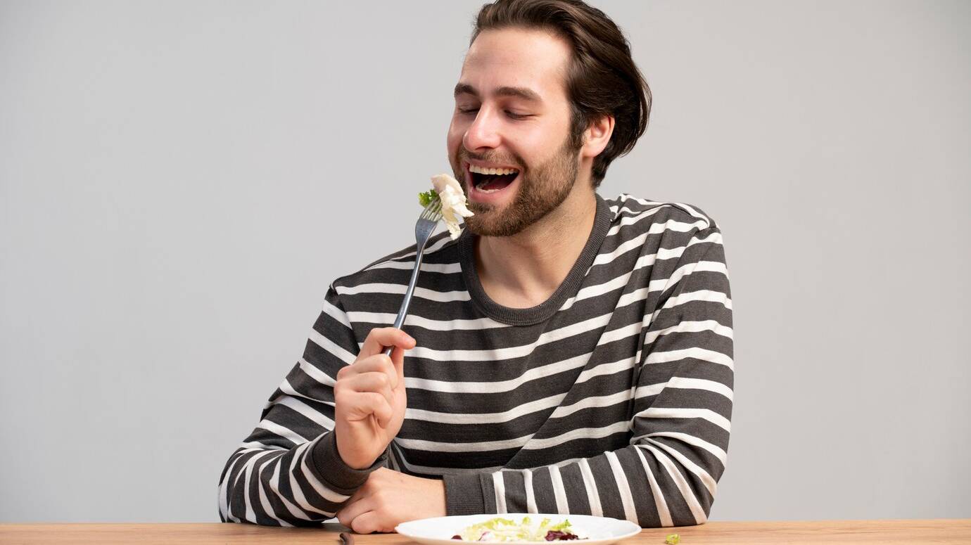 person-with-eating-disorder-trying-eat-healthy_23-2149243068