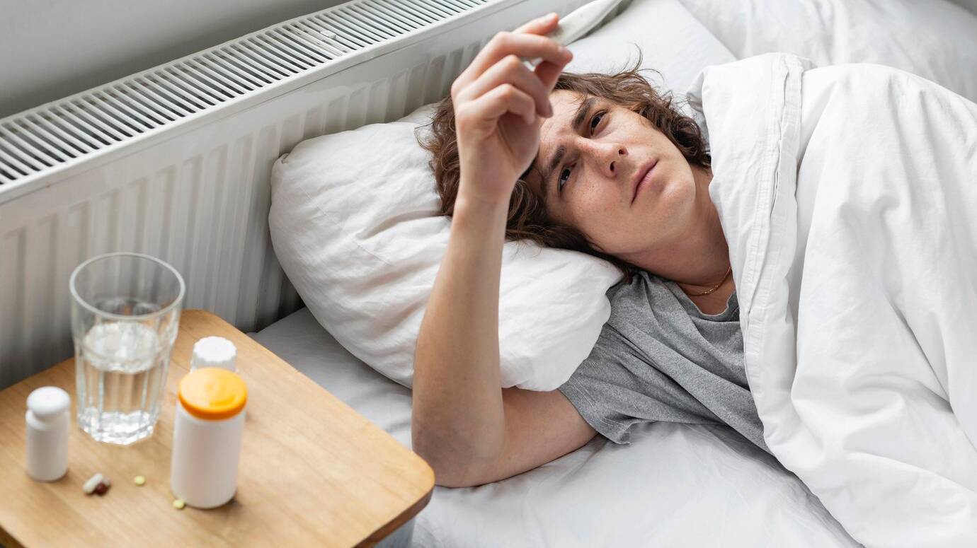 sick-young-man-resting-bed_23-2148944883