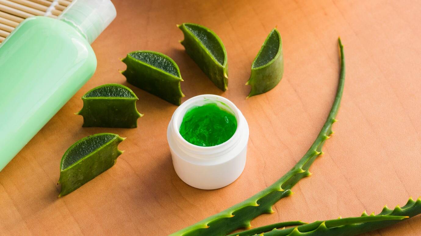 aloe-vera-leaves-with-beauty-cream-bottle_23-2148173892
