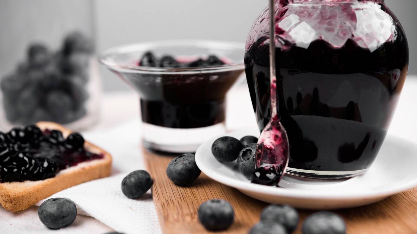 composition-with-jar-blueberry-jam_23-2148626034