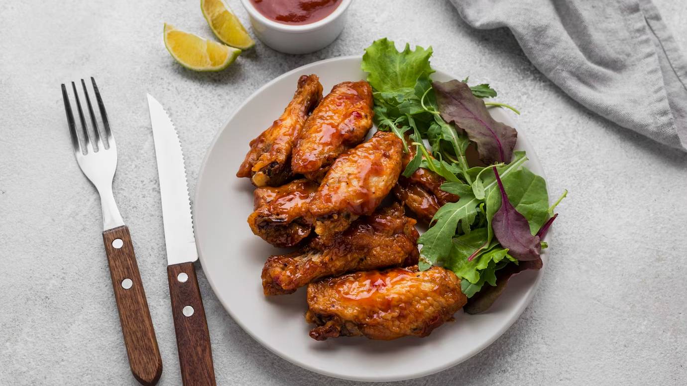high-angle-plate-with-fried-chicken-salad-with-sauce-cutlery_23-2148646615 high-angle-plate-with-fried-chicken-salad-with-sauce-cutlery_23-2148646615