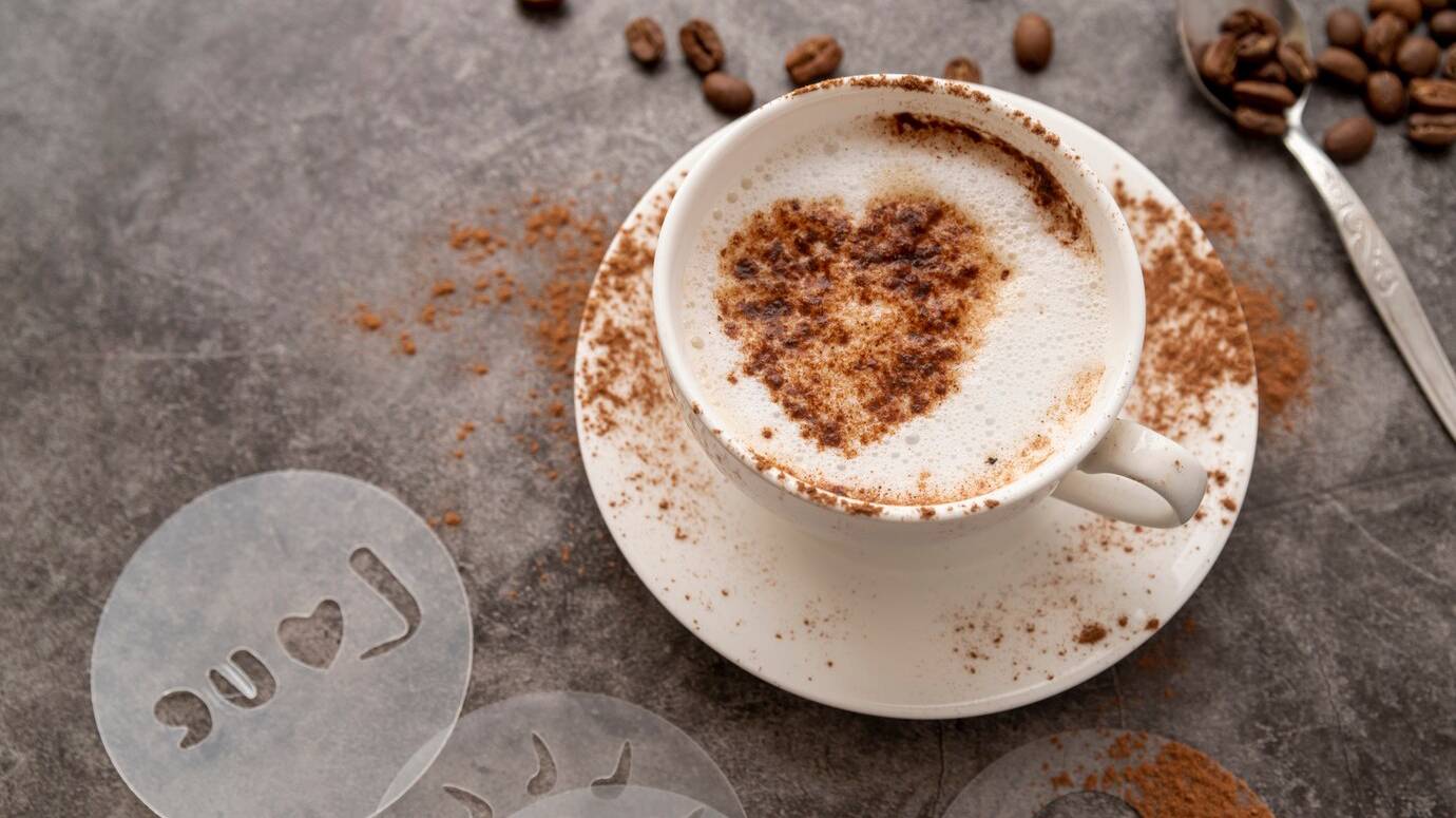 high-view-cup-coffee-with-heart_23-2148251578