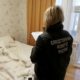 Следователь в квартире, где произошло убийство