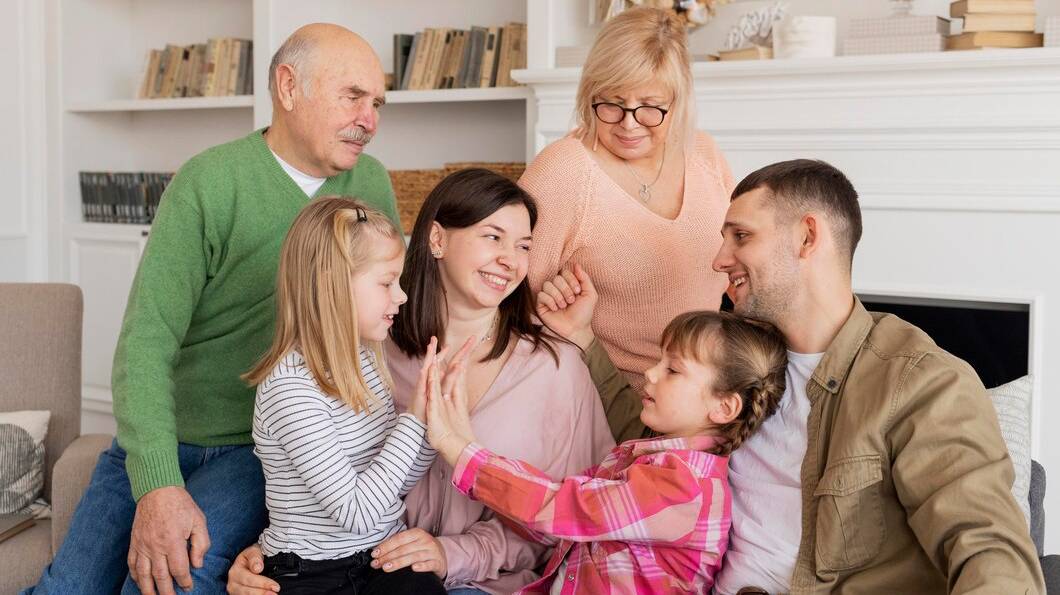 medium-shot-happy-family-couch_23-2148880331 medium-shot-happy-family-couch_23-2148880331