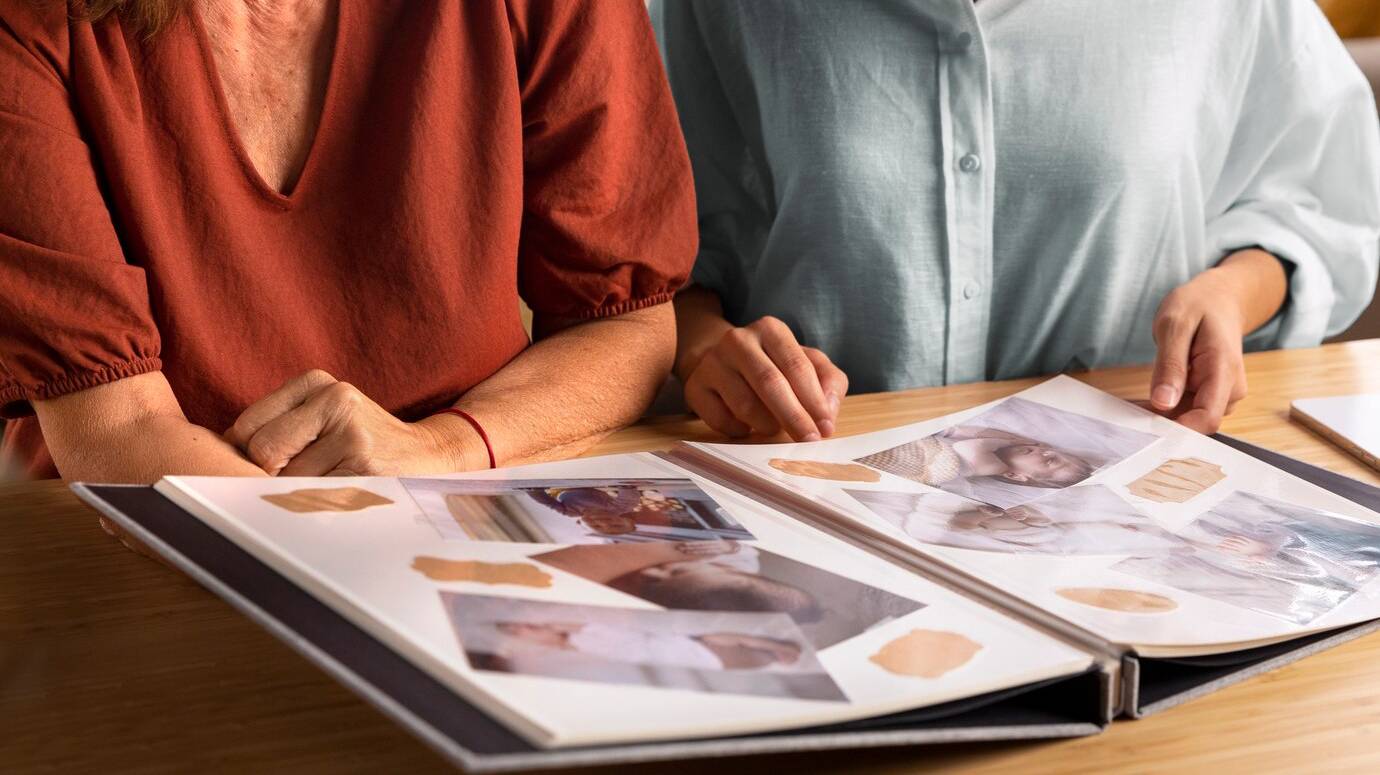 people-looking-picture-album-front-view_23-2149515312