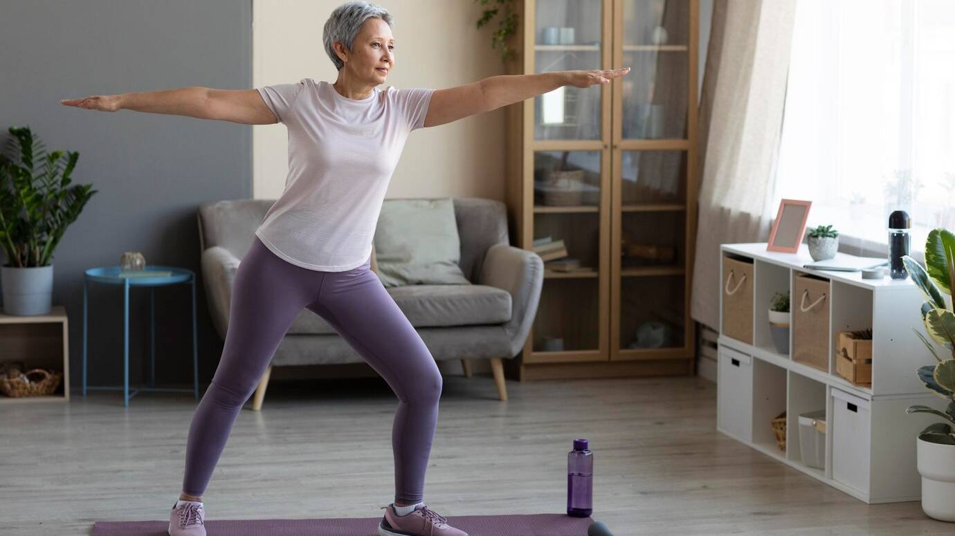 senior-woman-training-home_23-2148730097