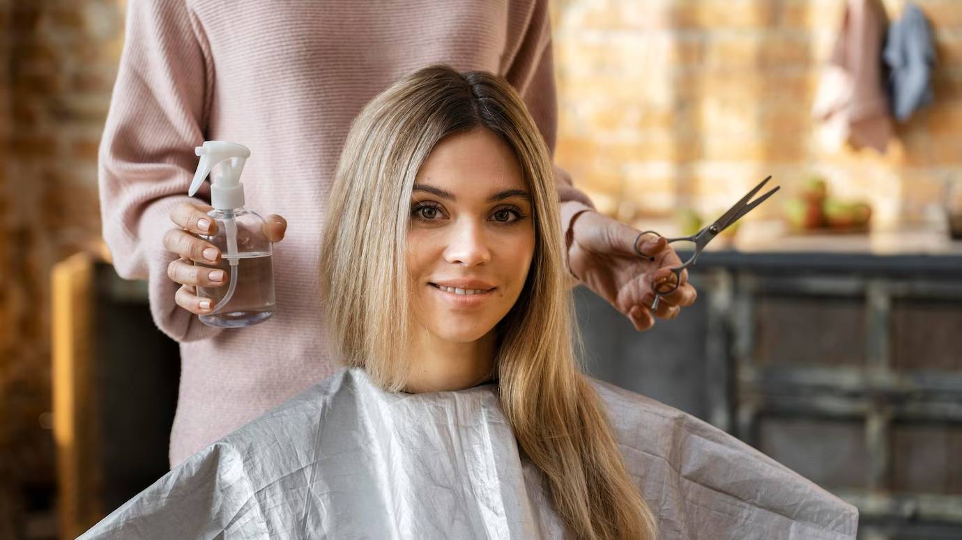 beautiful-woman-getting-her-hair-cut-home-by-hairdresser_23-2148817217