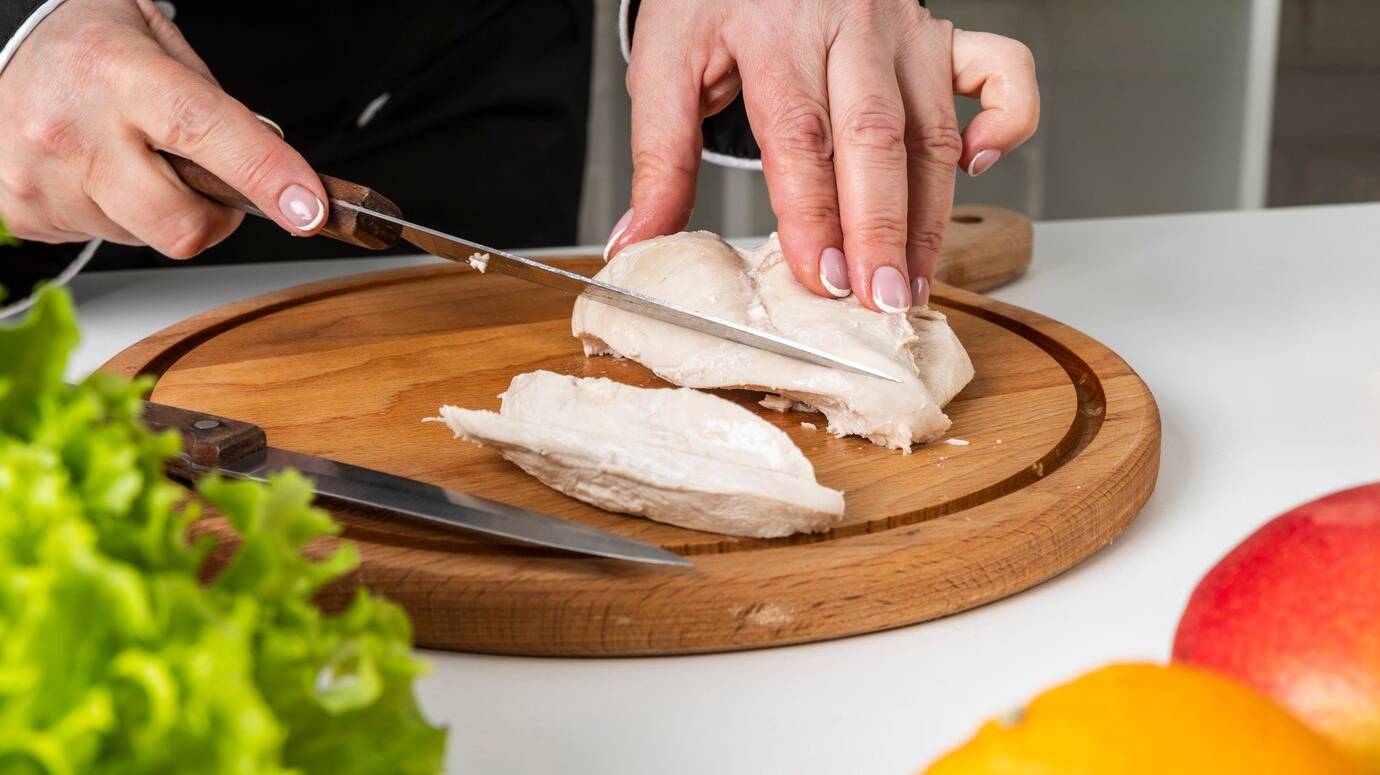 chef-using-chopping-board-knife_23-2148491353