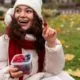 front-view-woman-eating-berries_23-2150062951