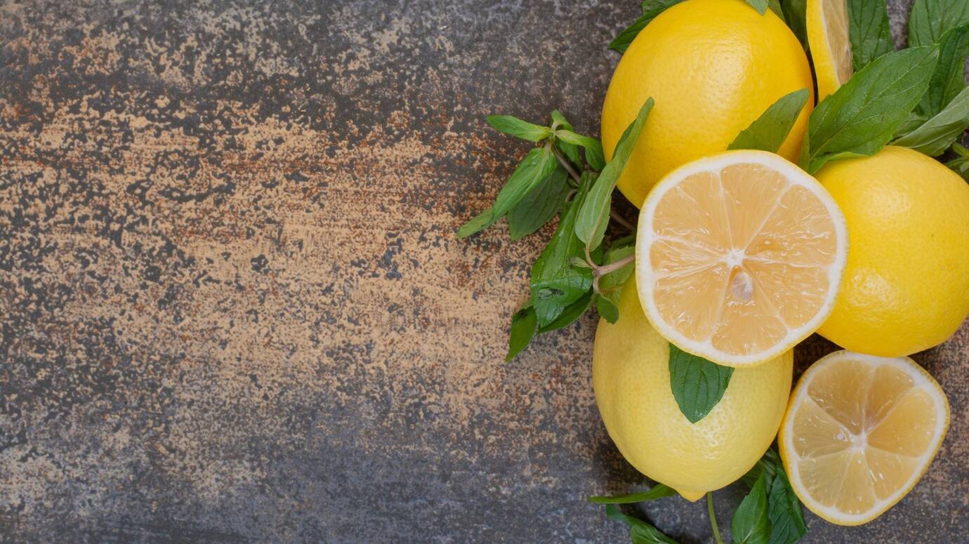 slices-lemon-with-mint-marble-space_114579-33510