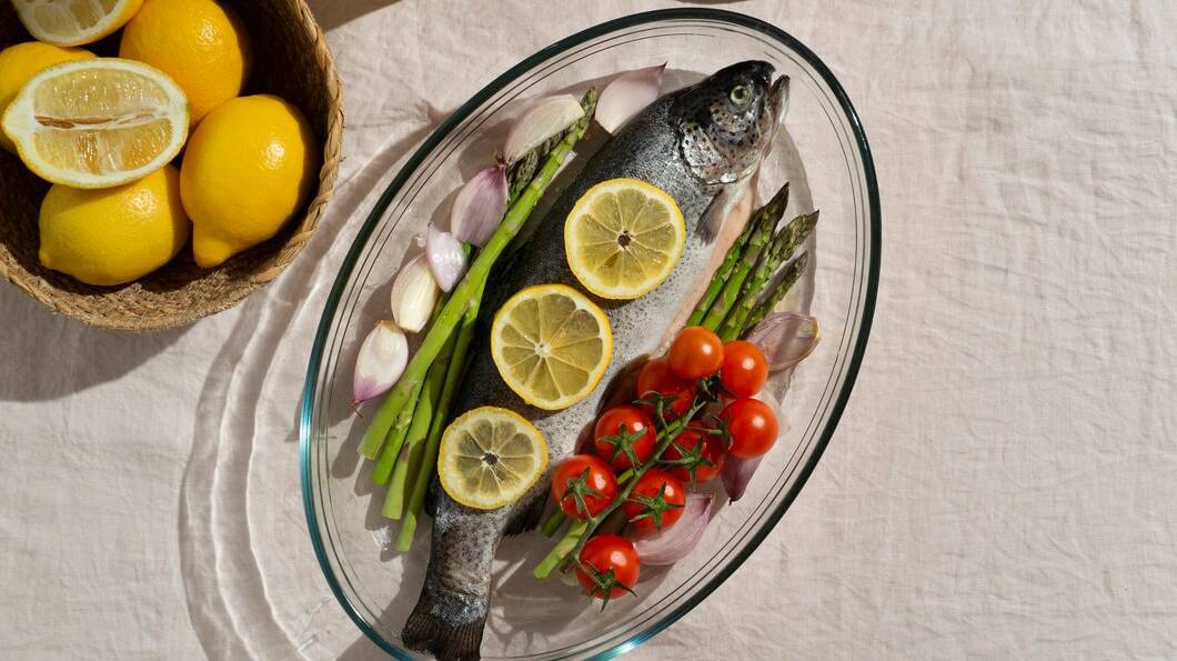 top-view-raw-trout-still-life_23-2150408604