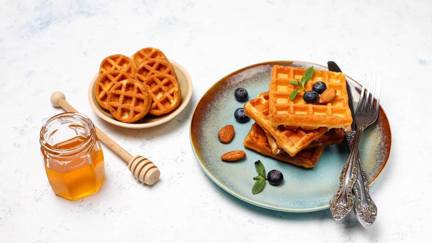 traditional-belgian-waffles-with-fresh-berries-honey-grey-concrete-surface_114579-5315 traditional-belgian-waffles-with-fresh-berries-honey-grey-concrete-surface_114579-5315