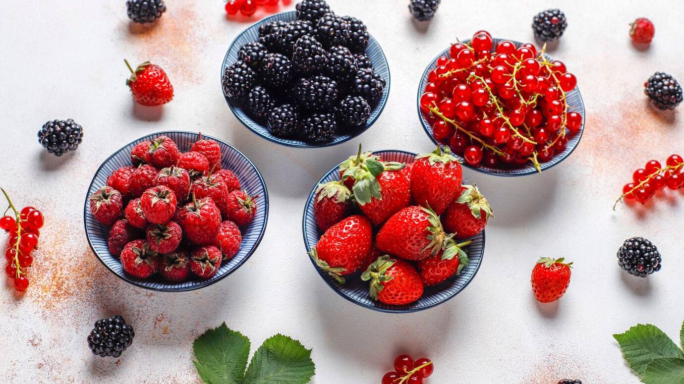 various-fresh-summer-berries-blueberries-red-currant-strawberries-blackberries-top-view_114579-12403