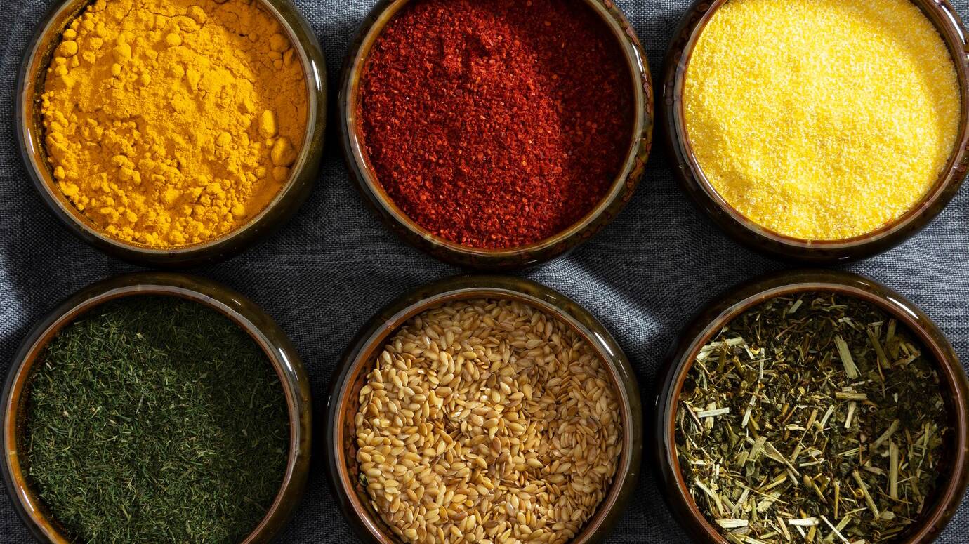 bowls-with-spices-arrangement-flat-lay_23-2149439576