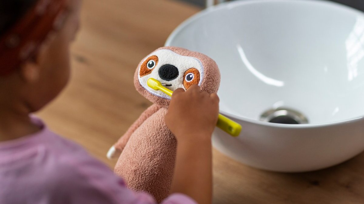 cute-girl-with-stuffed-toy_23-2150573806