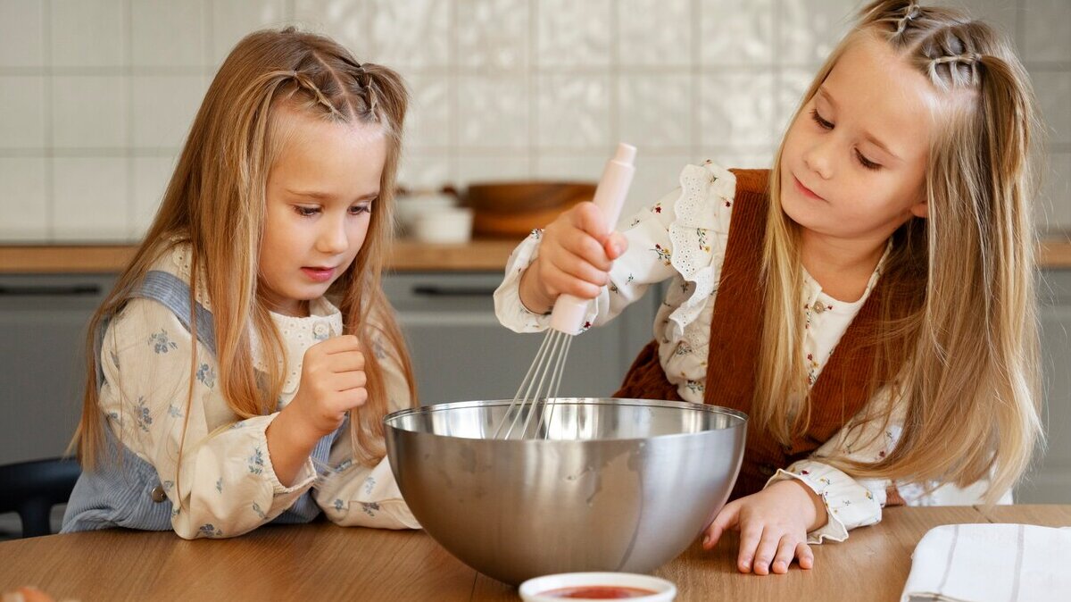 medium-shot-girls-cooking-together_23-2149926329