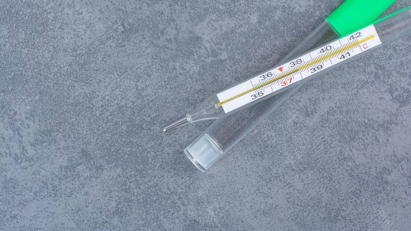 single-thermometer-isolated-marble-surface_114579-54677