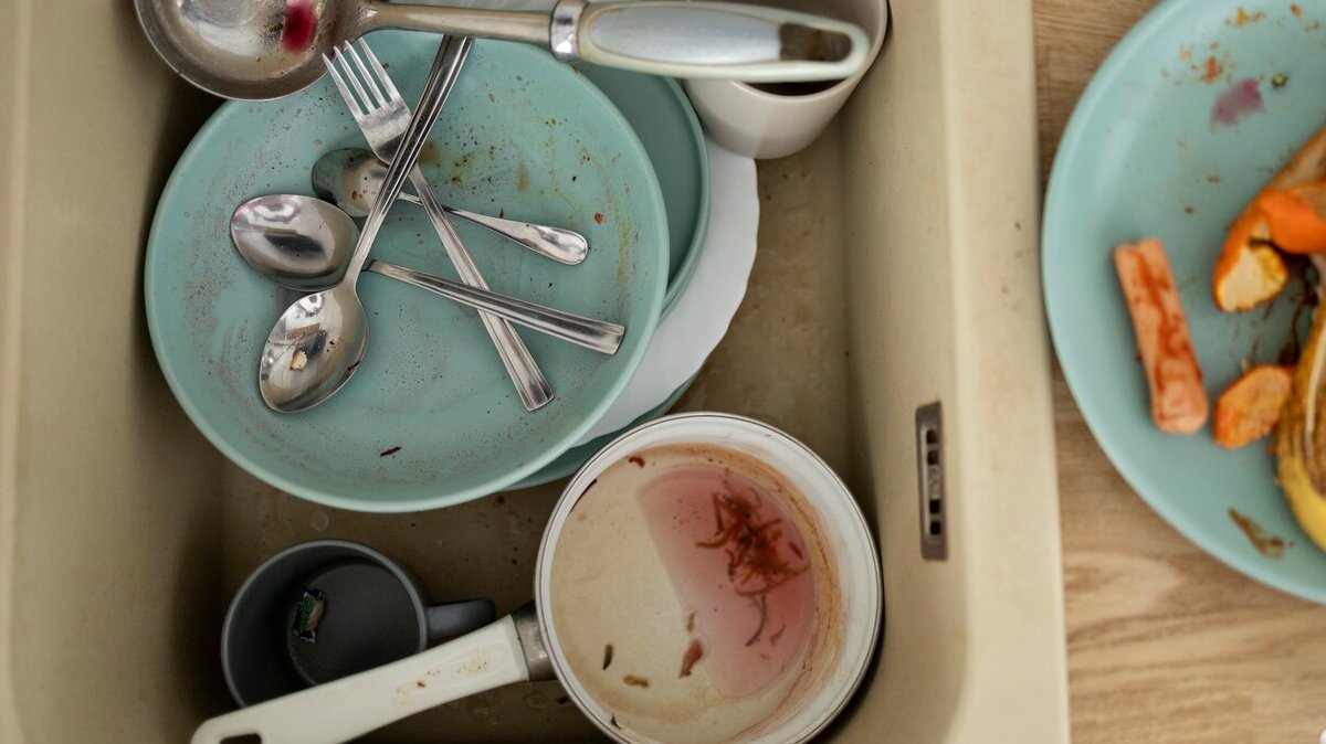 top-view-dirty-dishes-cups-sink_23-2149363726