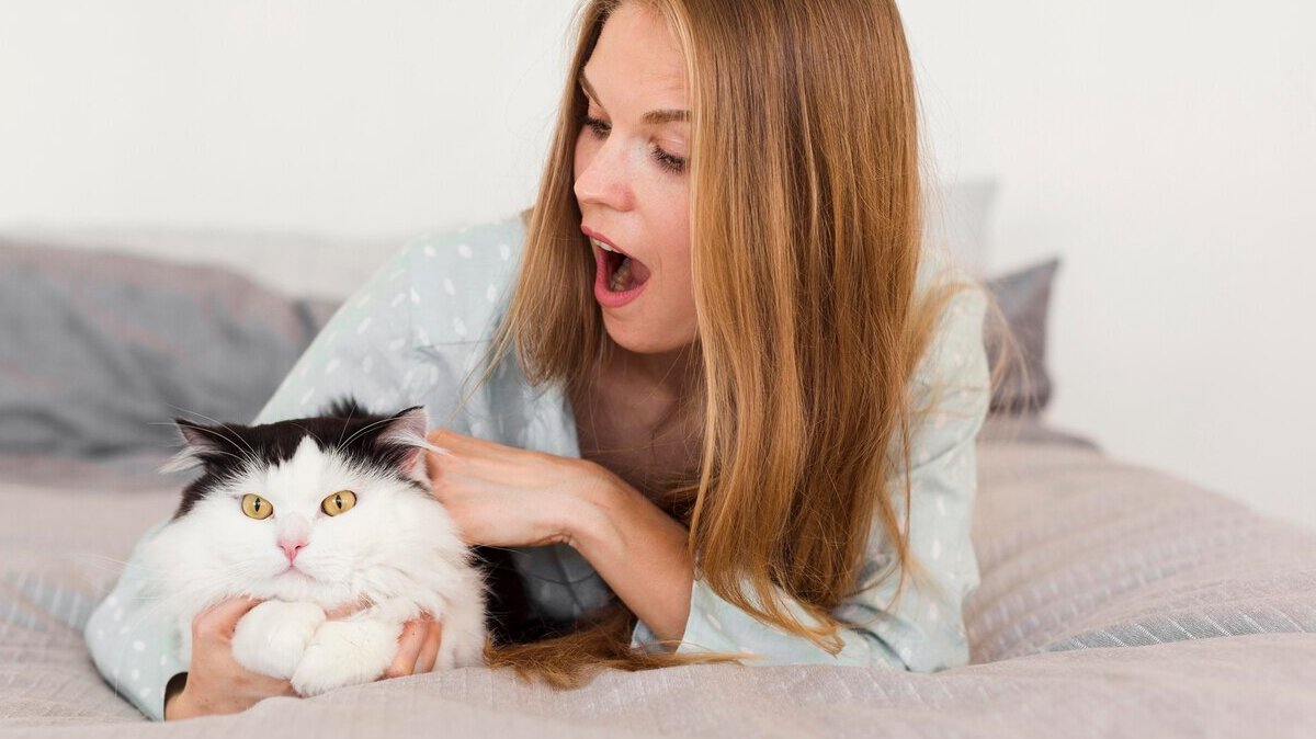 woman-bed-wearing-pajamas-with-cat_23-2148557231 woman-bed-wearing-pajamas-with-cat_23-2148557231