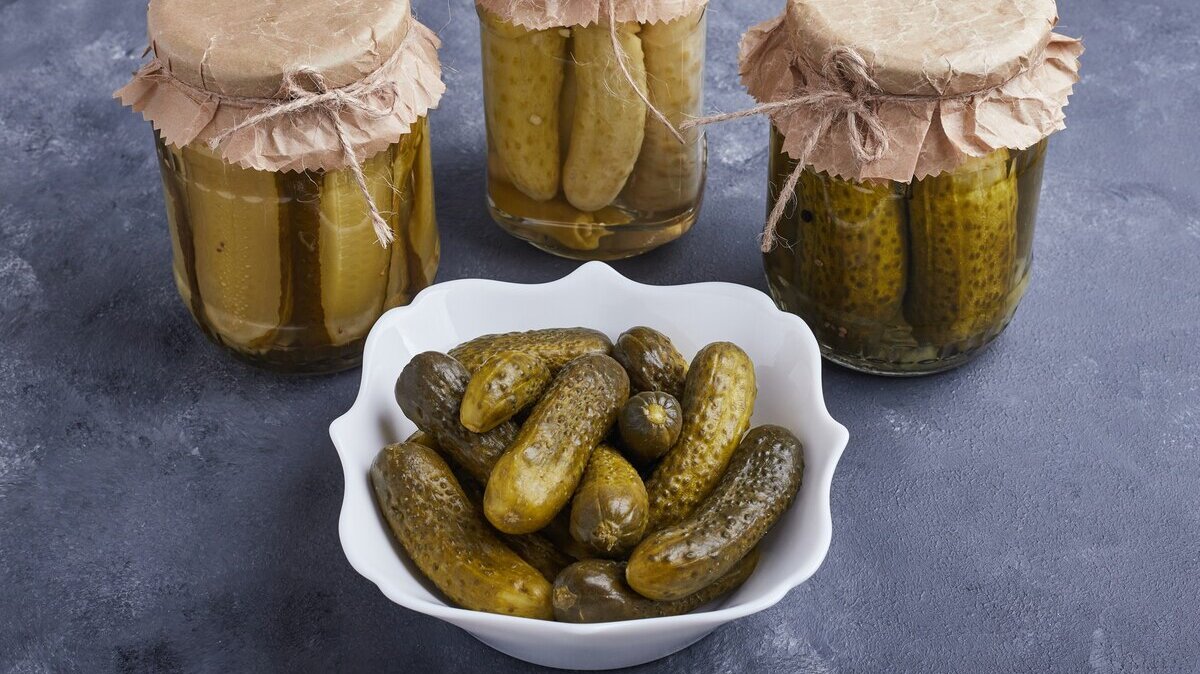 pickled-cucumbers-bowl-glass-jars-blue-surface_114579-14693 pickled-cucumbers-bowl-glass-jars-blue-surface_114579-14693