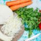 top-view-fresh-vegetables-greens-sliced-cabbage-carrots-spicy-hot-peppers-bright-blue-food-meal-vegetable-lunch-healthy-salad_140725-34465
