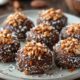 круглые конфеты из фиников и кокосовой стружки с грецкими орехами