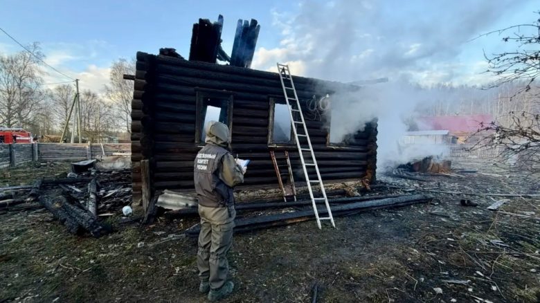 Следователь на месте пожара